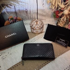 CHANEL Black Quilted Chevron Zip Wallet